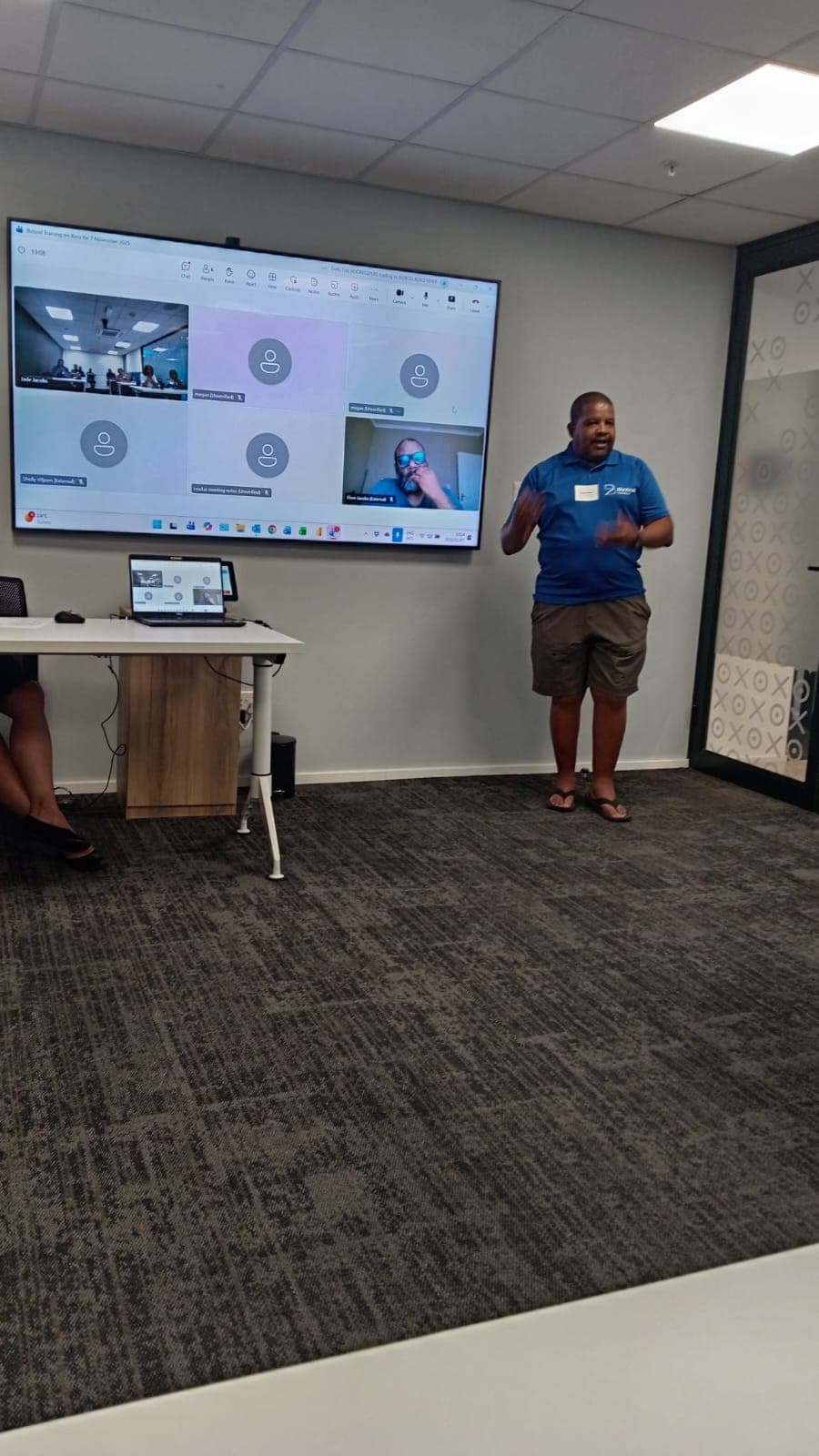 A BizXcel team member leading an in-house training session